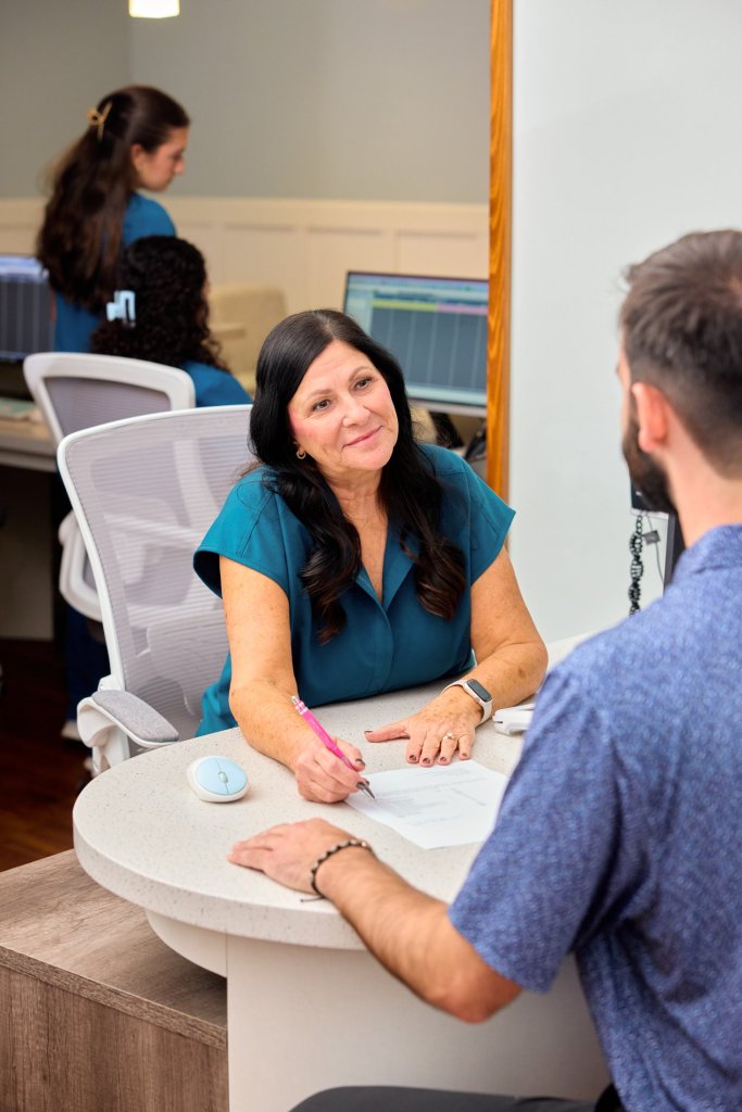 Patient talking to a dentist