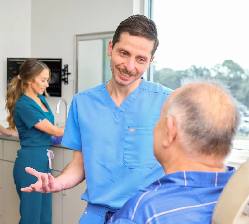 Dr Ismail talking to a patient