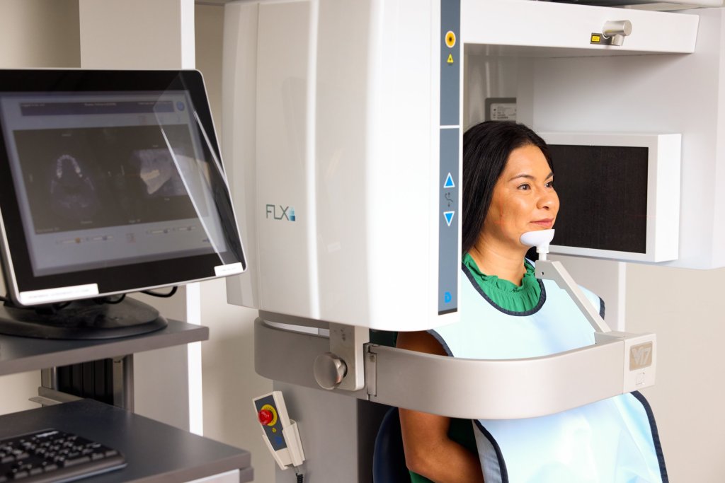 Woman having mouth scanned with 3D Imaging